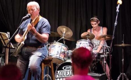 Natalie playing drums with her father, Bobby Martin